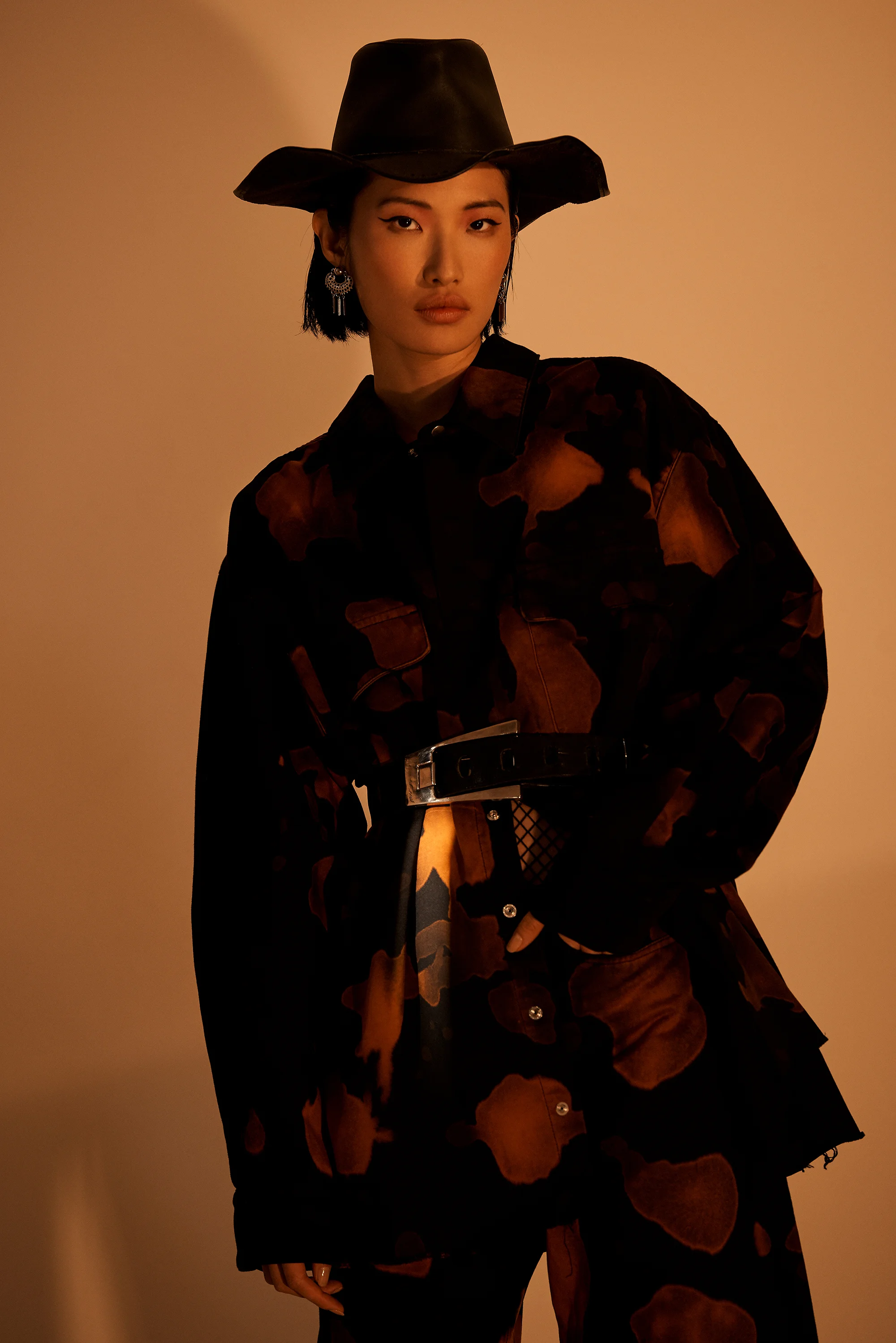 Hat and Earring Vintage. Jacket and pants Marques Almeida . Belt Vintage