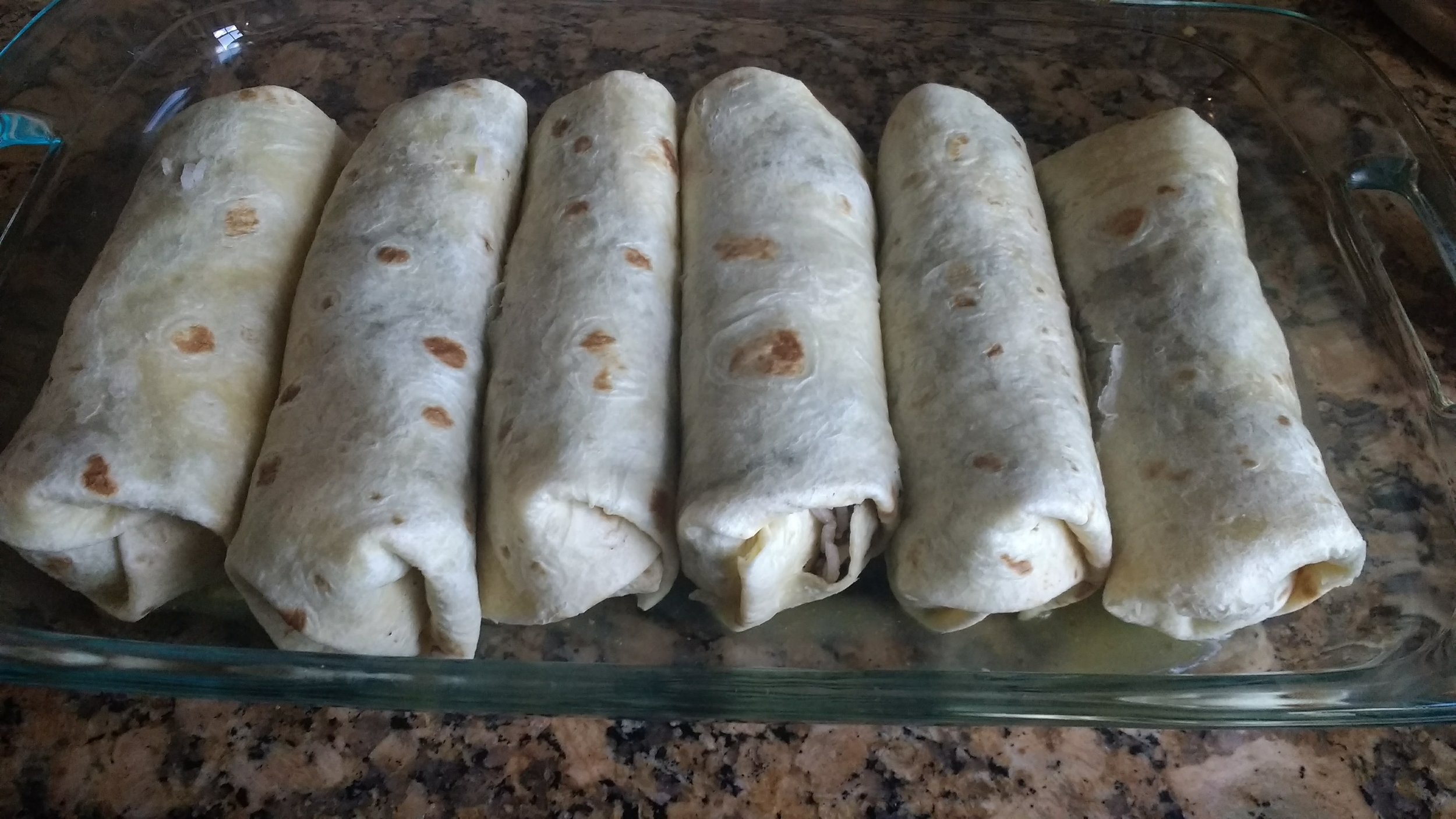 six burritos snug in a row