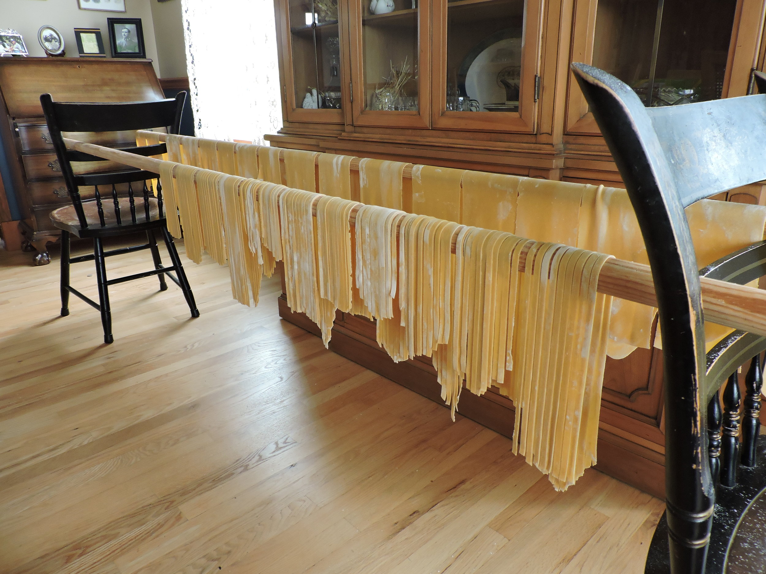  Both cut strands and pasta sheets drying midway through cutting pasta. I'm doing three batches here as I was making two for the family and one as a postpartum meal for a friend. 