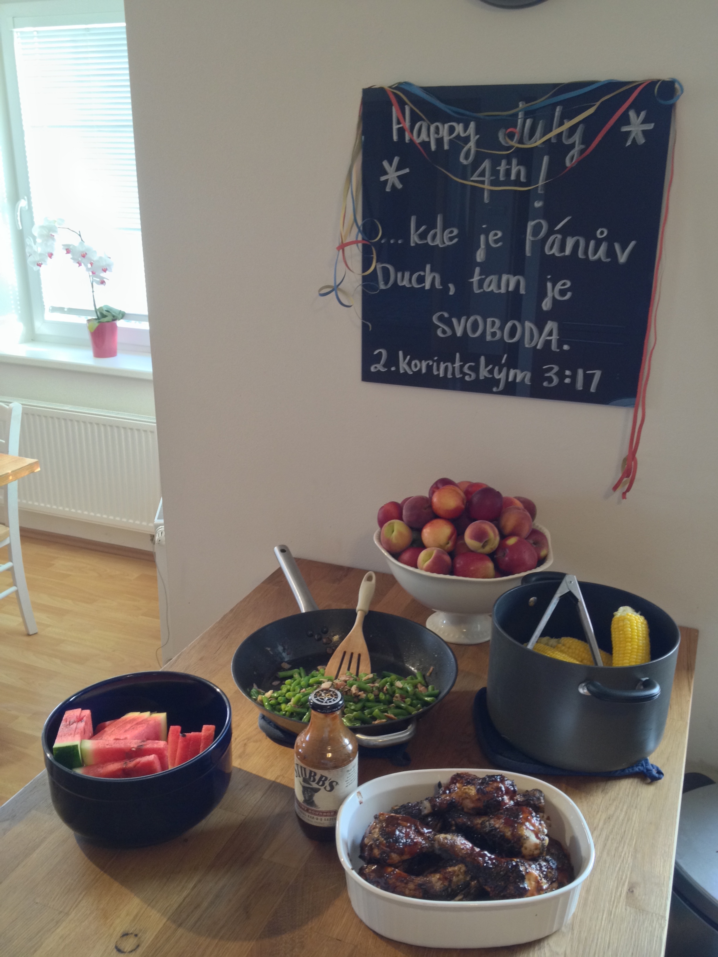 All American dinner. The chalkboard above says in Czech, "...where the Spirit of the Lord is, there is freedom," 2 Corinthians 3:17. 