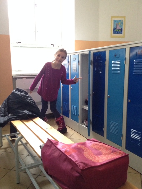 The kids go to a locker room at the beginning of the day to take off their coats and boots and hats and gloves and ski pants (it's true!). They have to be seriously bundled to walk to school in the Czech Republic! 