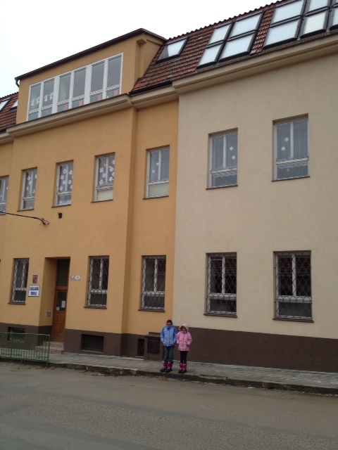 Shivering in front of the school after a successful sneak peak. 