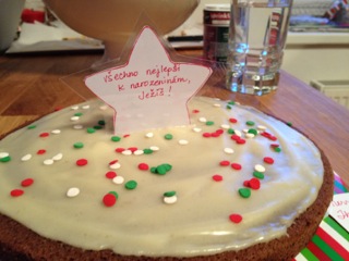 The cake with a sign that reads "Happy Birthday, Jesus" in Czech, which is much longer with way more consonants than in English (and that sums up the language, from what I can tell so far). 