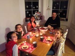 Our family getting ready to blow out the candles on our Happy Birthday, Jesus cupcakes on Christmas night. 