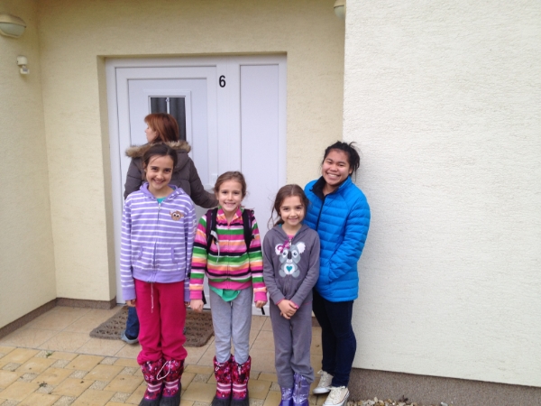 The girls waiting while our landlord unlocks the door. It was an exciting moment for them! 