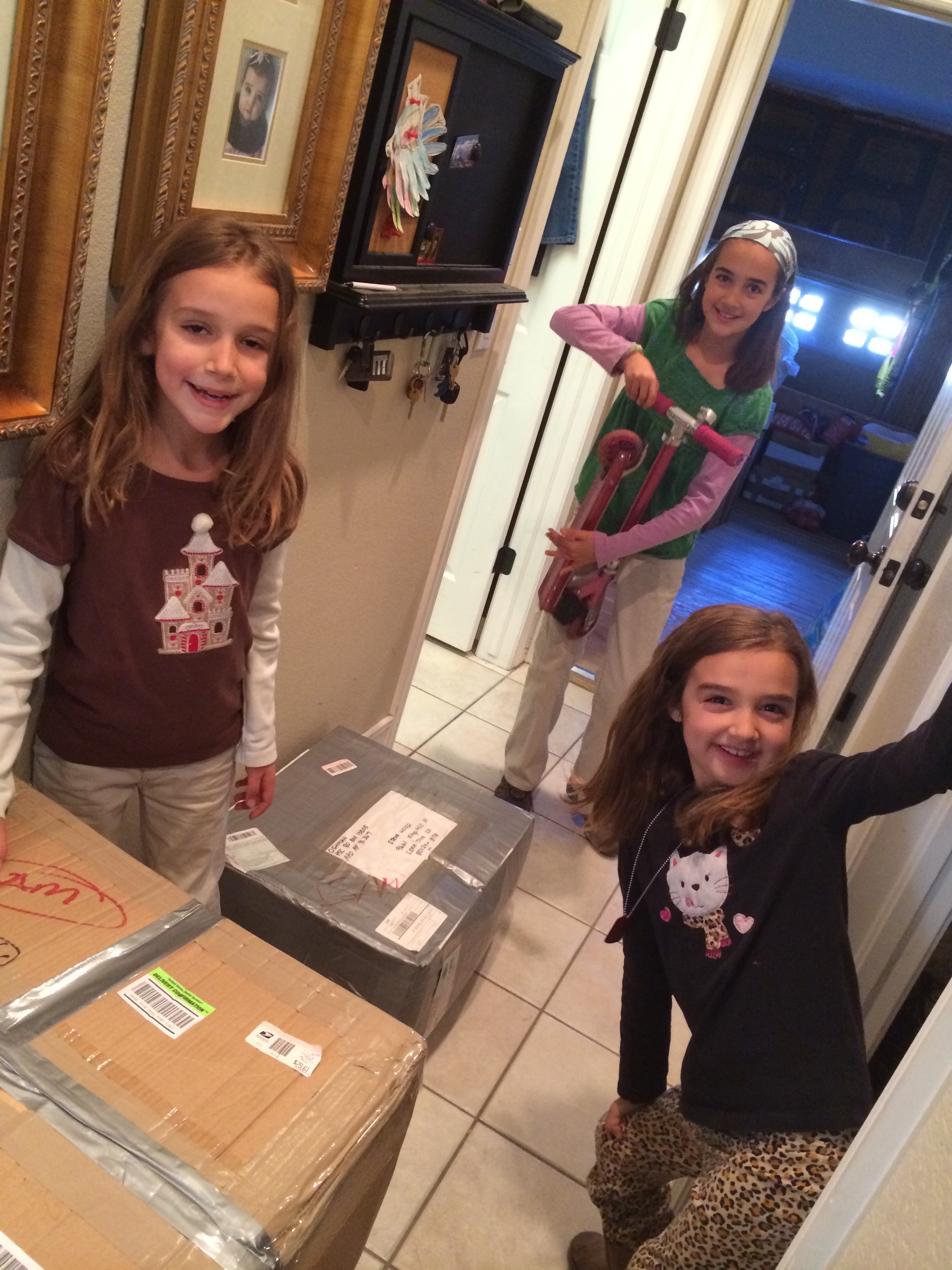 Once all the boxes were packed in my in-laws' basement we lugged them upstairs and into the garage. The girls are actually at a helpful age, which is awesome. 