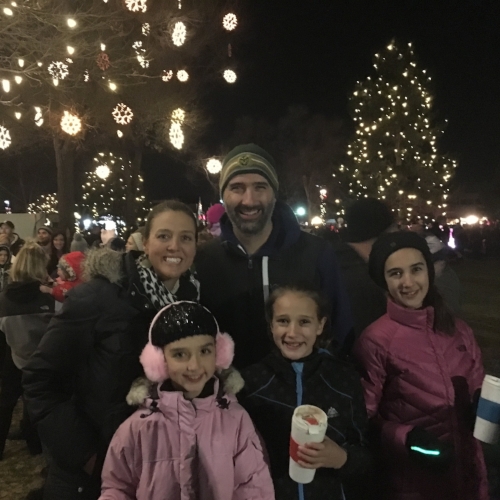 Our family last night at the Christmas Tree lighting on Main Street (minus Rebekah who was hard at work at Kneader's Bakery). 