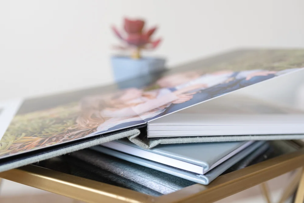 stack of family photo albums