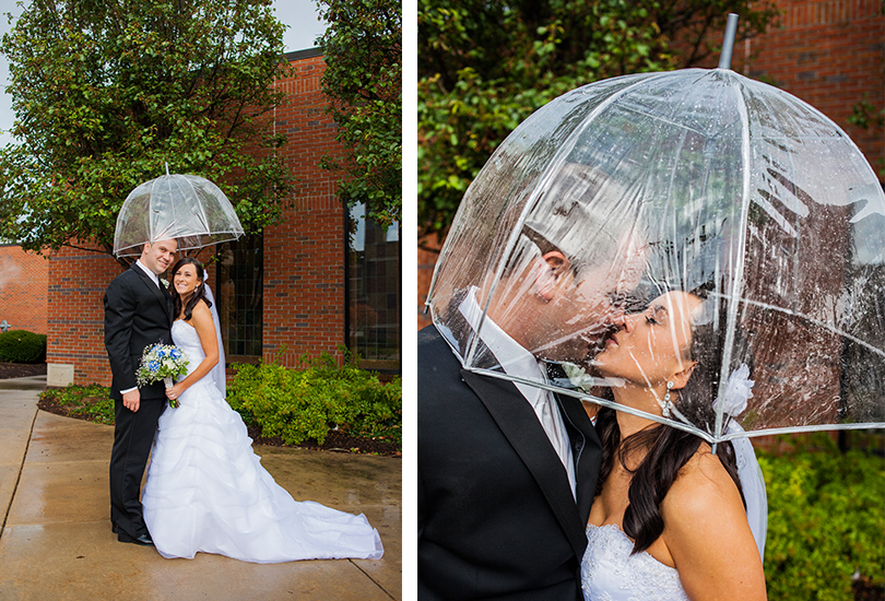 Speedway-Indiana-Saint-Christopher-catholic-church-wedding-photographer-bride-groom-kiss-under-umbrella-rainy-day-portrait.jpg