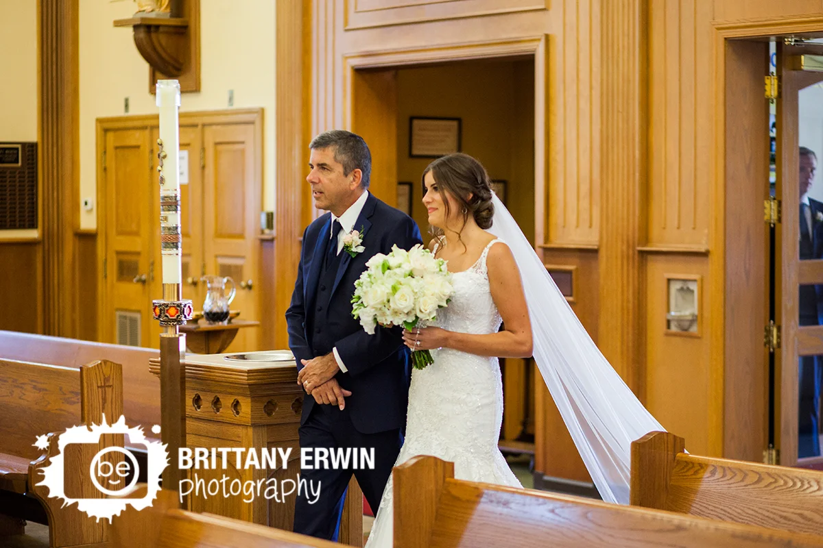 Indianapolis-wedding-ceremony-photographer-bride-with-father-walk-down-aisle-st-roch.jpg