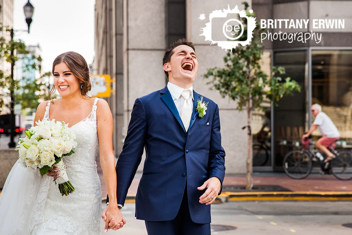 Indianapolis-downtown-wedding-photographer-urban-couple-walk-laugh-fun-bridal-portrait.jpg