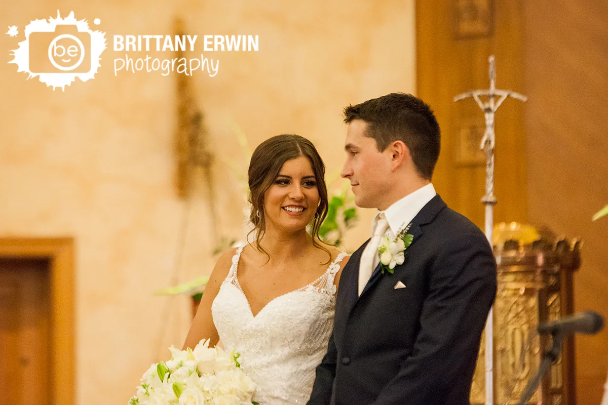 Indianapolis-catholic-church-wedding-photographer-bride-groom-at-altar.jpg