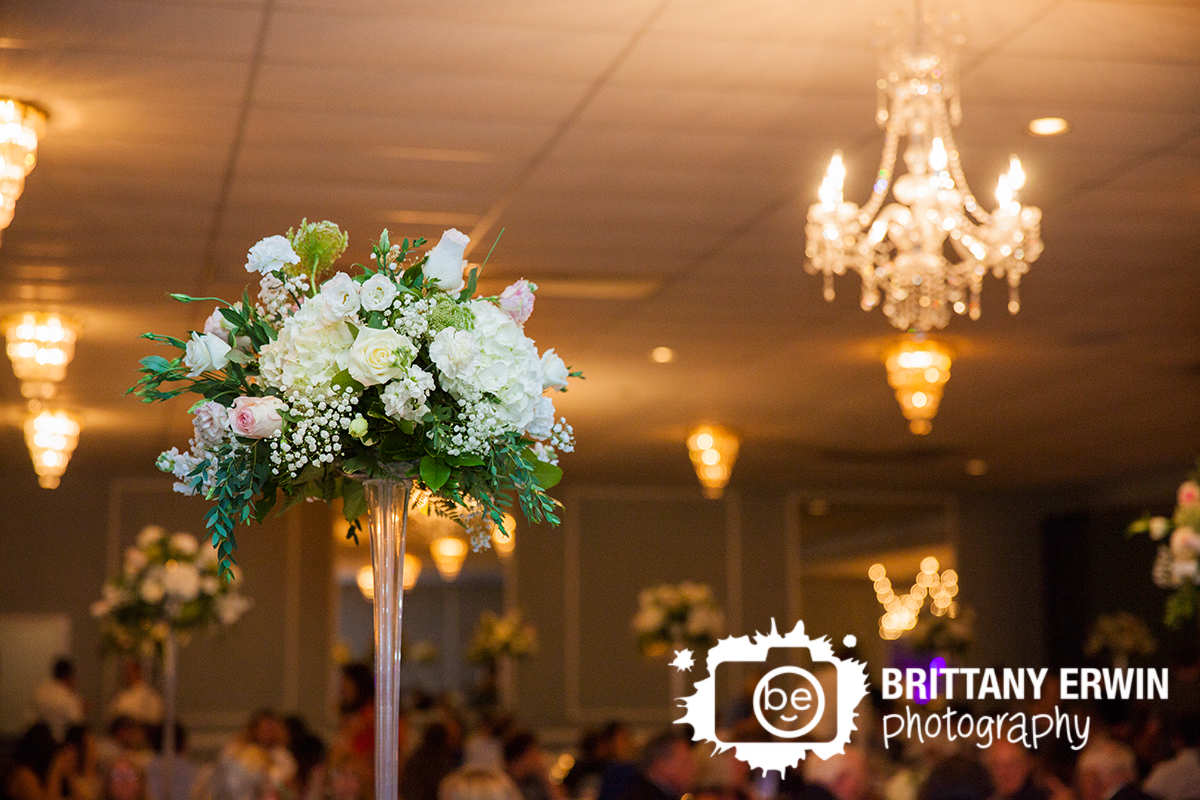 The-Palms-wedding-reception-photographer-tall-centerpiece-our-backyard-flowers.jpg