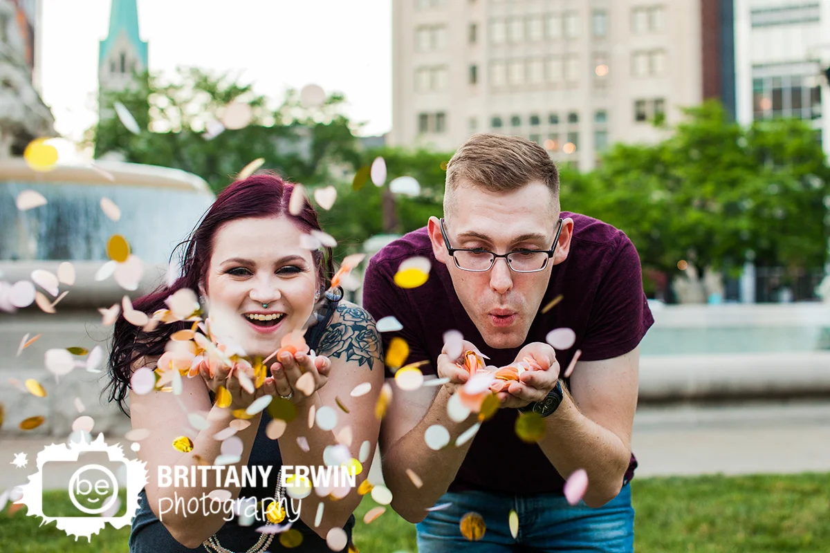 Indianapolis-downtown-engagement-portrait-photographer-confetti-fun-laughing-couple.jpg