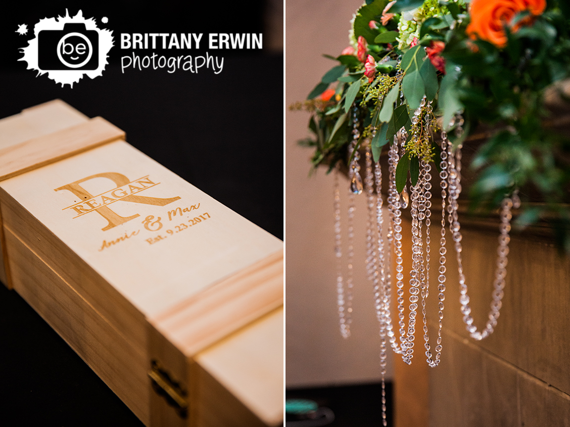 Indianapolis-wedding-ceremony-photographer-flower-piece-on-mantle-of-fireplace-wine-box.jpg