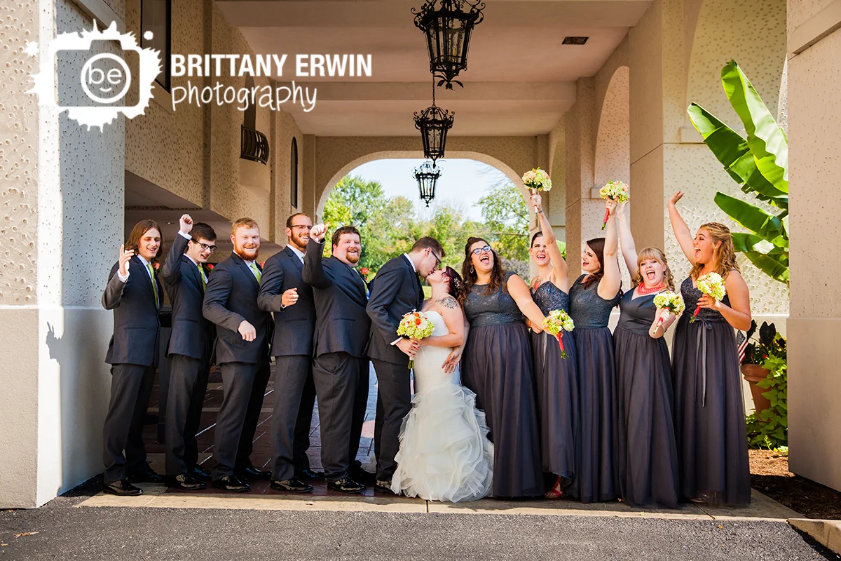 Indianapolis-wedding-photographer-bridal-party-portrait-couple-kiss-hillcrest-country-club.jpg