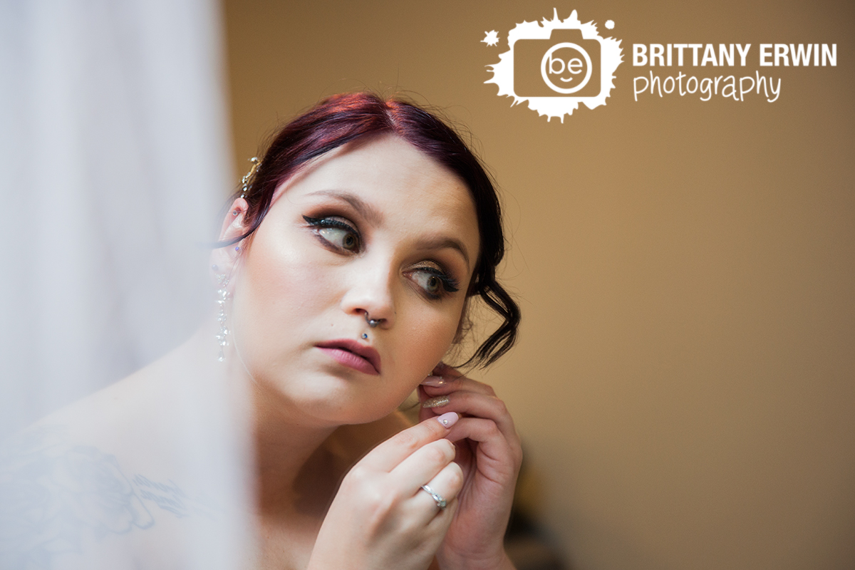 Indianapolis-wedding-photographer-hillcrest-country-club-bride-earrings-in-mirror.jpg