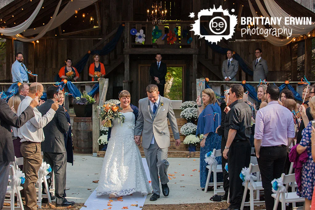 Story-Inn-barn-wedding-photographer-ceremony-bride-groom-walk-down-aisle.jpg
