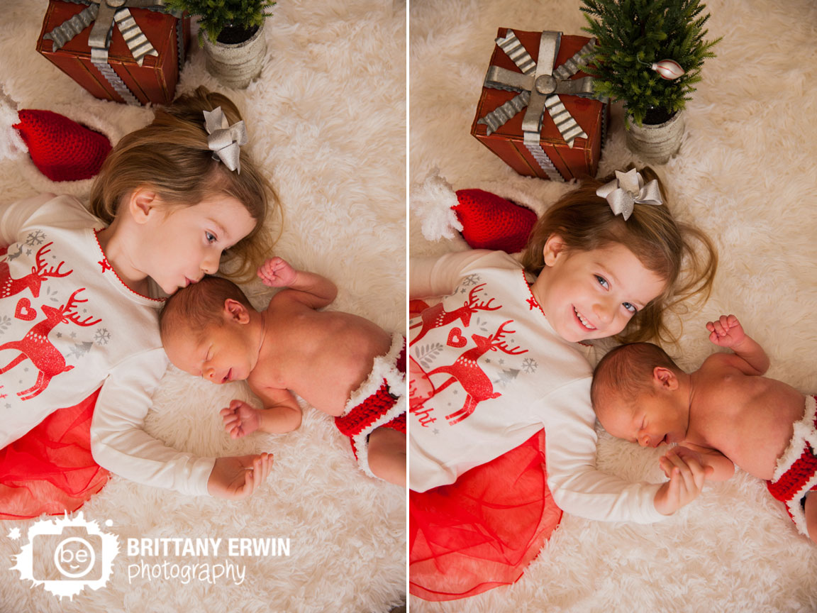 Speedway-Indiana-christmas-newborn-boy-with-sister-portrait-photographer-santa-hat.jpg