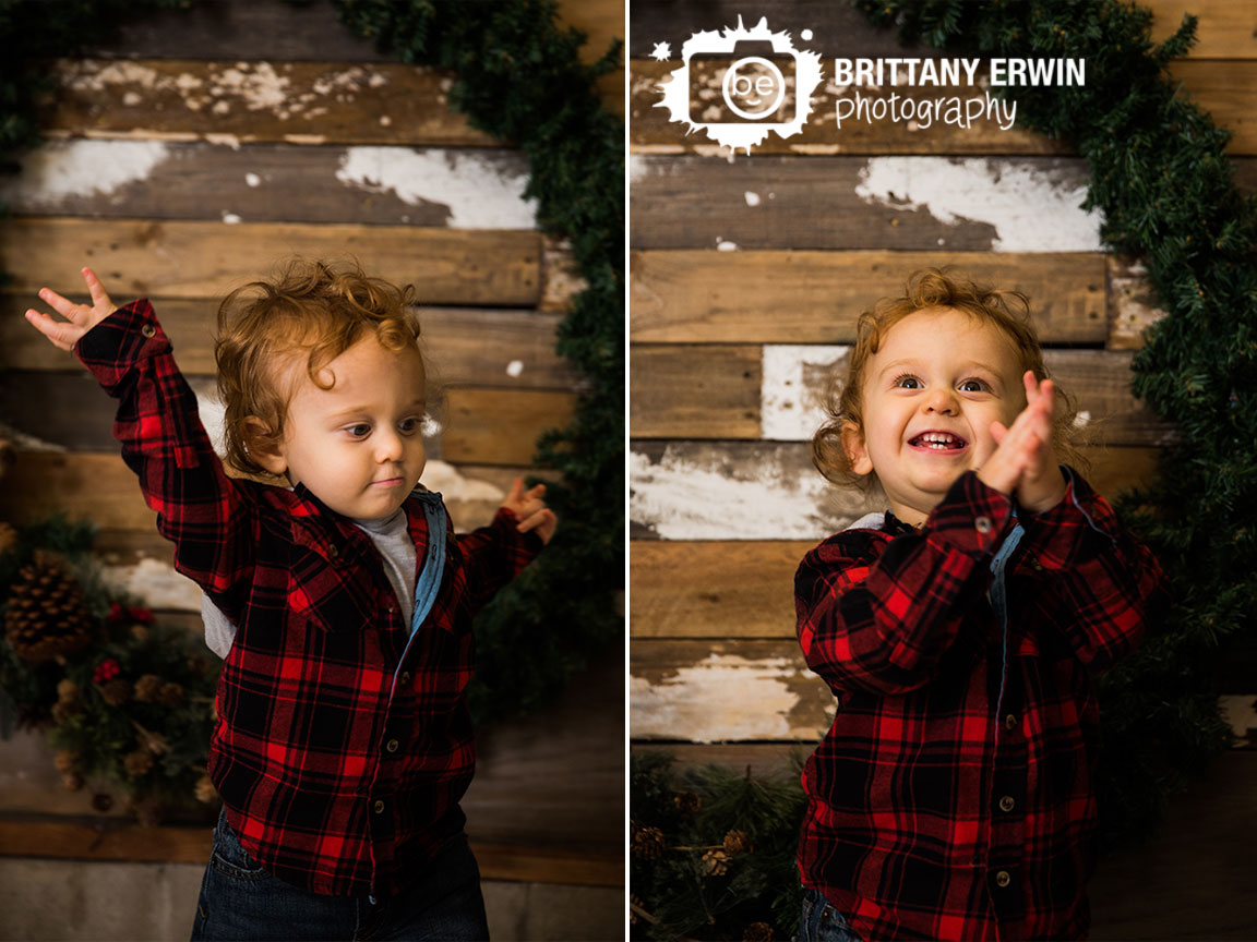 Speedway-christmas-mini-session-photographer-plaid-jacket-clapping-toddler-boy.jpg