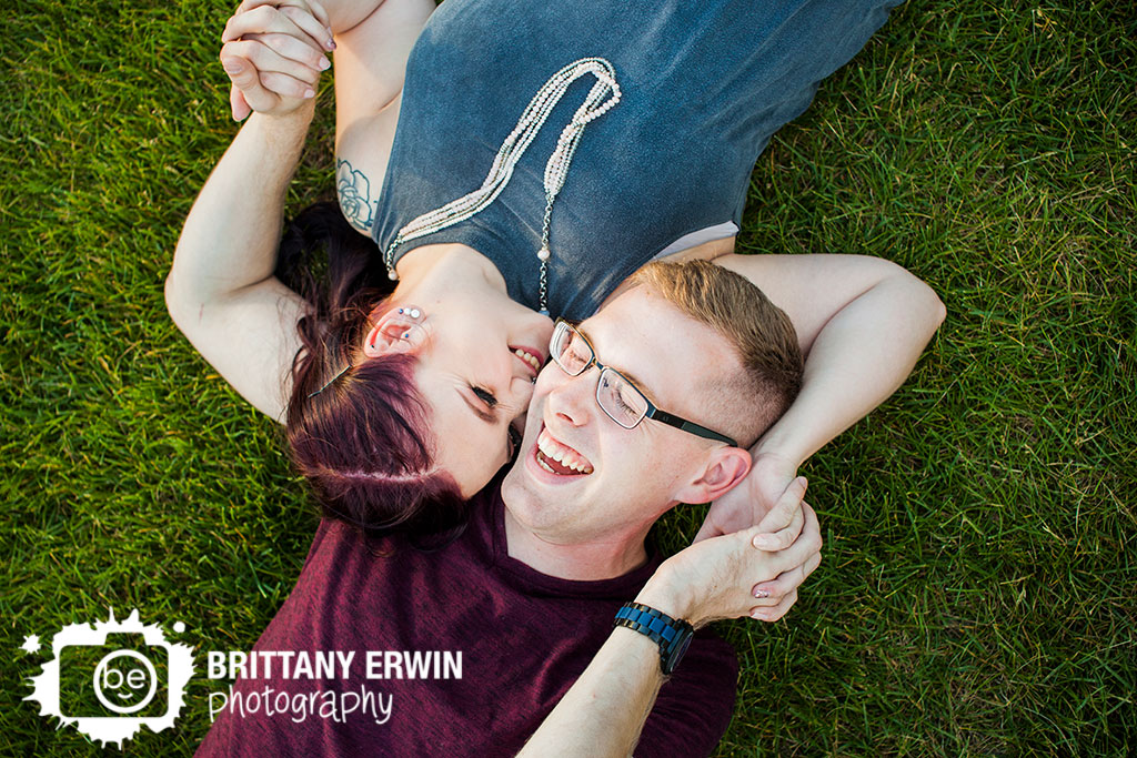 Downtown-Indianapolis-couple-portrait-photographer-engagement-engaged-laughing-in-grass.jpg