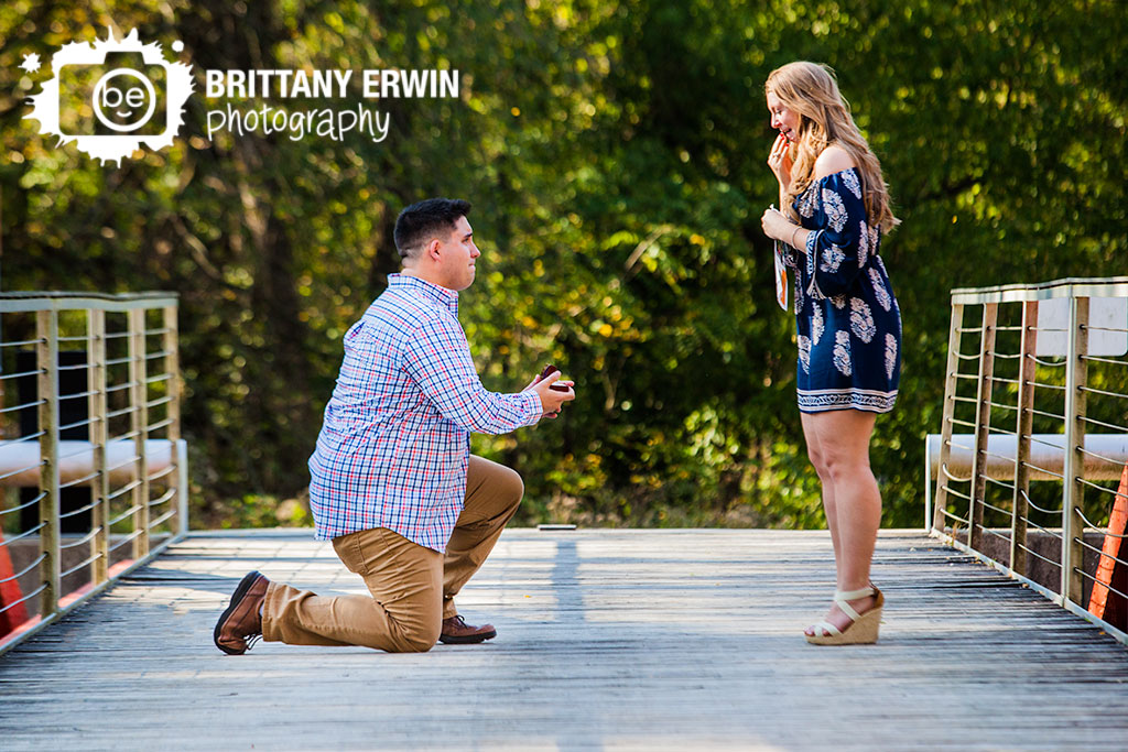 Indianapolis-museum-of-art-IMA-100-acres-park-surprise-proposal-photographer-couple-on-bridge-over-canal-she-said-yes-reaction.jpg