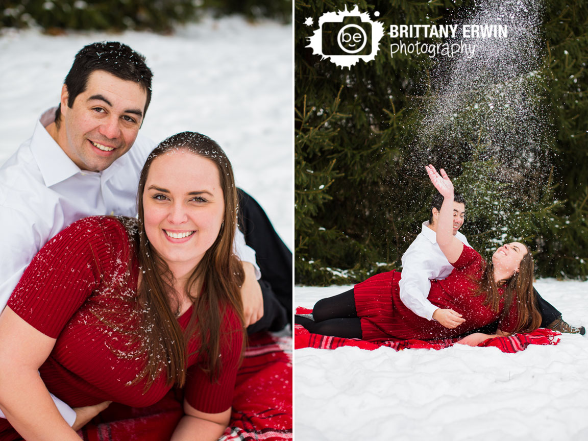 Indianapolis-winter-engagement-portrait-photographer-couple-play-in-snow-throw-into-air.jpg