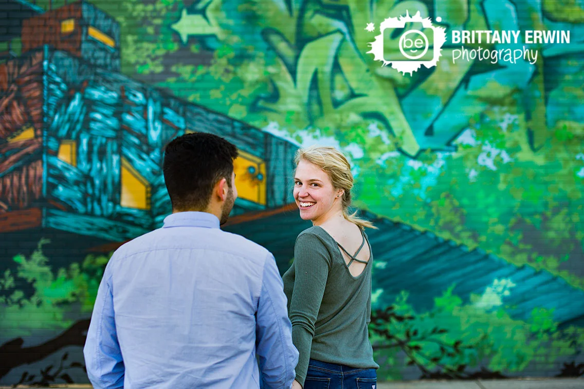 Fountain-Square-Indiana-engagement-portrait-photographer-couple-walk-mural.jpg