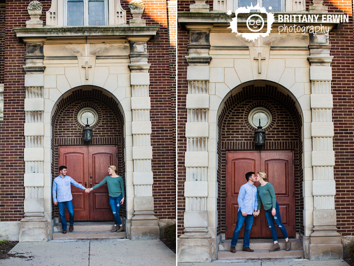 Fountain-Square-Indiana-church-engagement-portrait-photographer-couple-hold-hands-archway.jpg