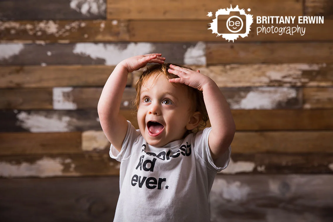 Indianapolis-portrait-studio-photographer-toddler-boy-silly-reclaimed-wood-wall.jpg