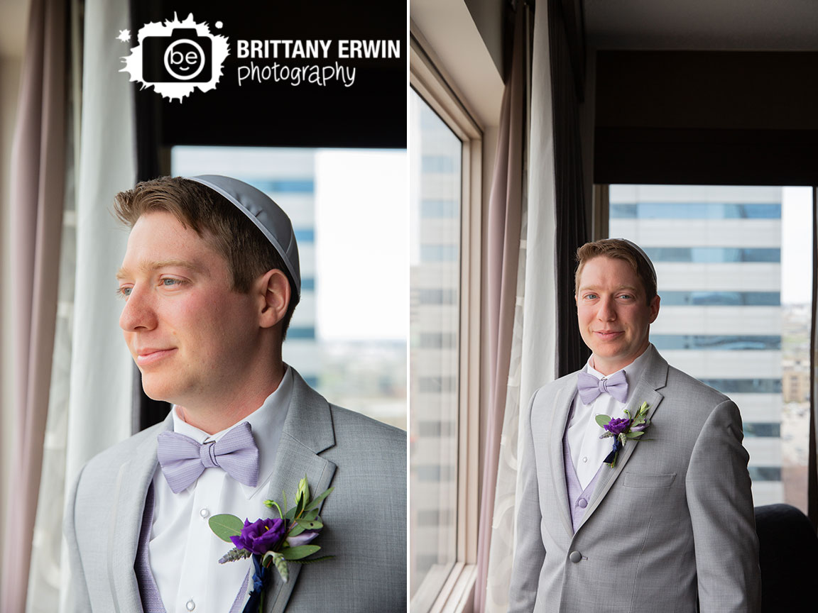 Downtown-Indianapolis-hotel-sheraton-Jewish-wedding-photographer-groom-getting-ready-window-portrait-violets-are-blue-boutonniere.jpg