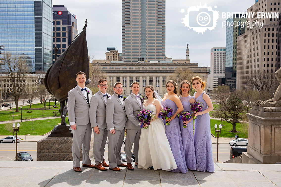 Indianapolis-downtown-skyline-Indiana-war-memorial-bridal-party-group-viloets-are-blue.jpg
