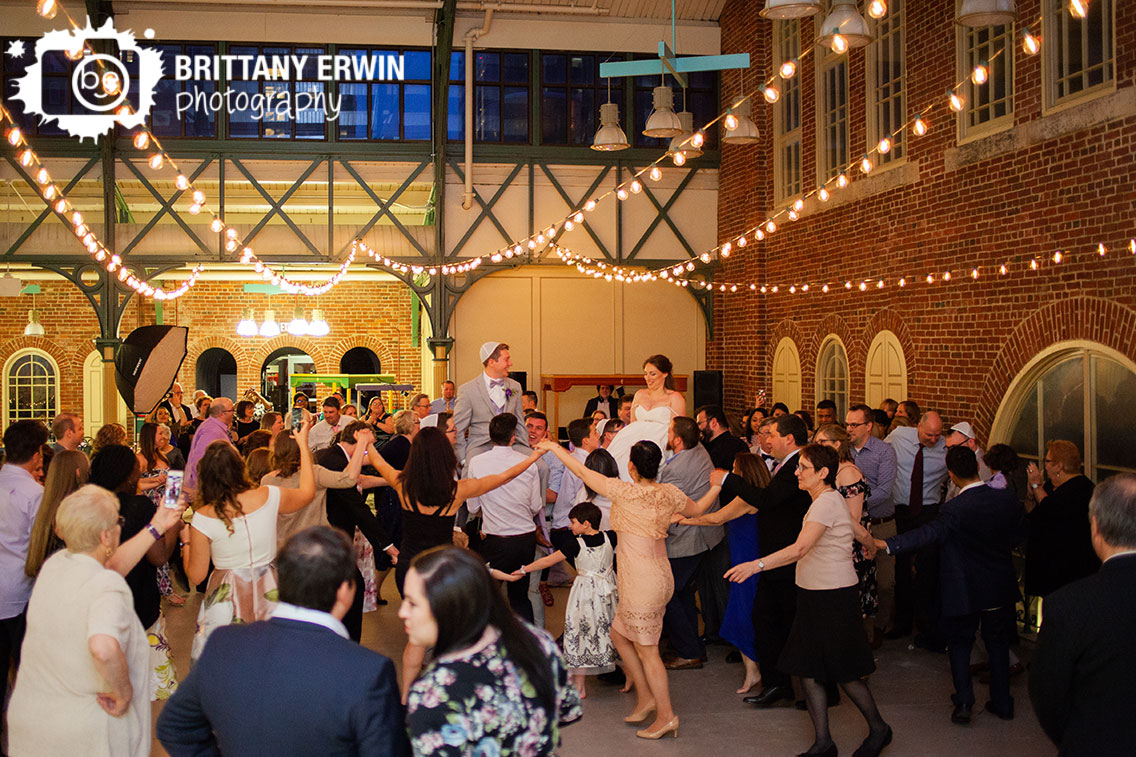 Indianapolis-wedding-photographer-jewish-reception-city-market-hora-couple.jpg