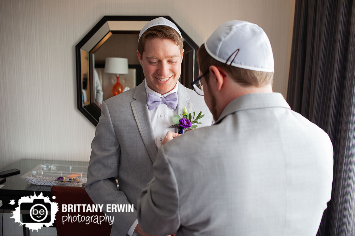 Downtown-Indianapolis-best-man-pin-boutonniere-on-groom-violets-are-blue-florist.jpg