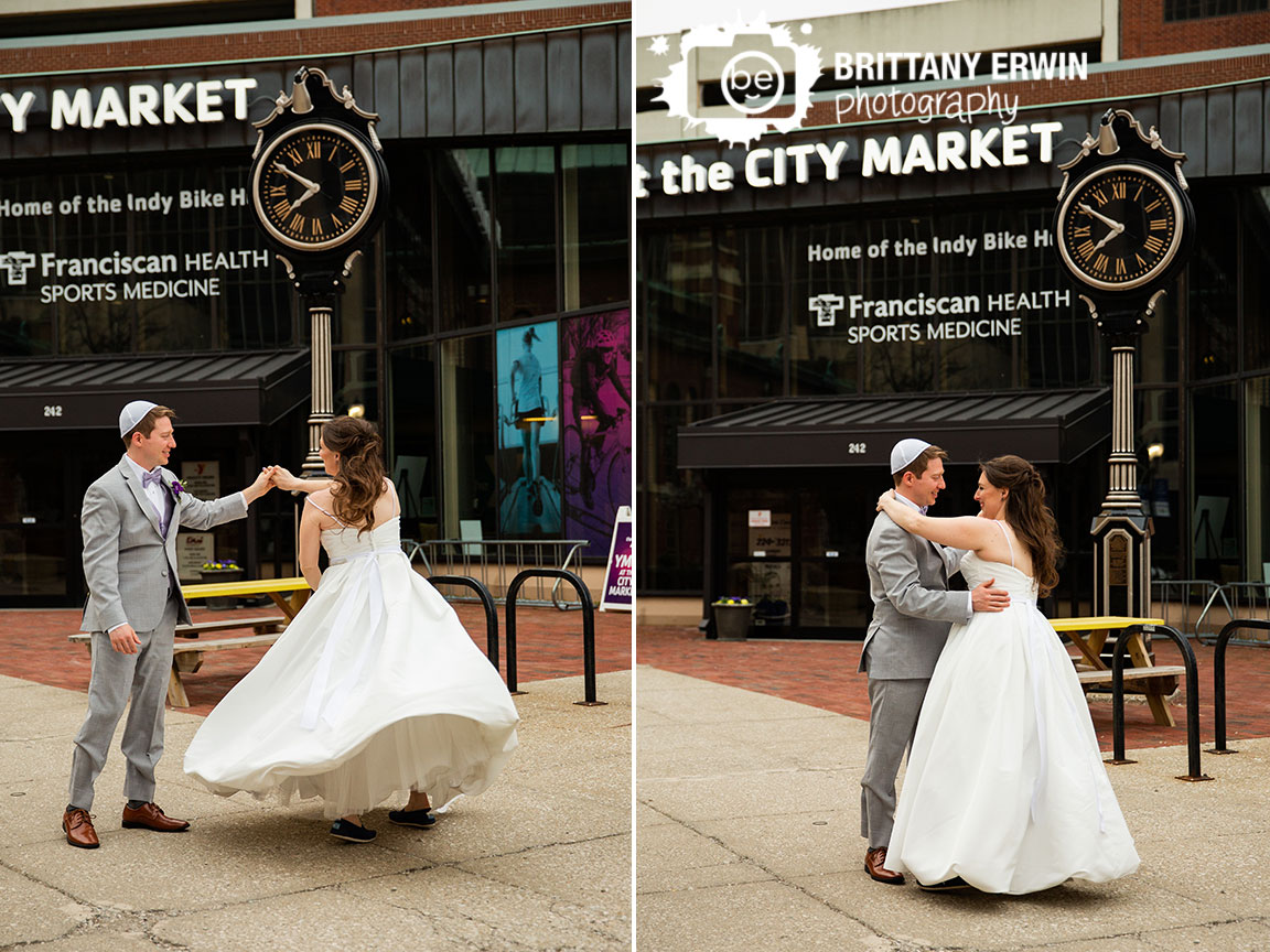 Downtown-Indianapolis-city-market-wedding-photographer-couple-dance-clock-twirl.jpg