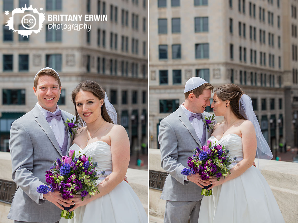 Downtown-Indianapolis-couple-first-look-on-monument-circle-violets-are-blue-indy-bouquet-hand-made-veil.jpg