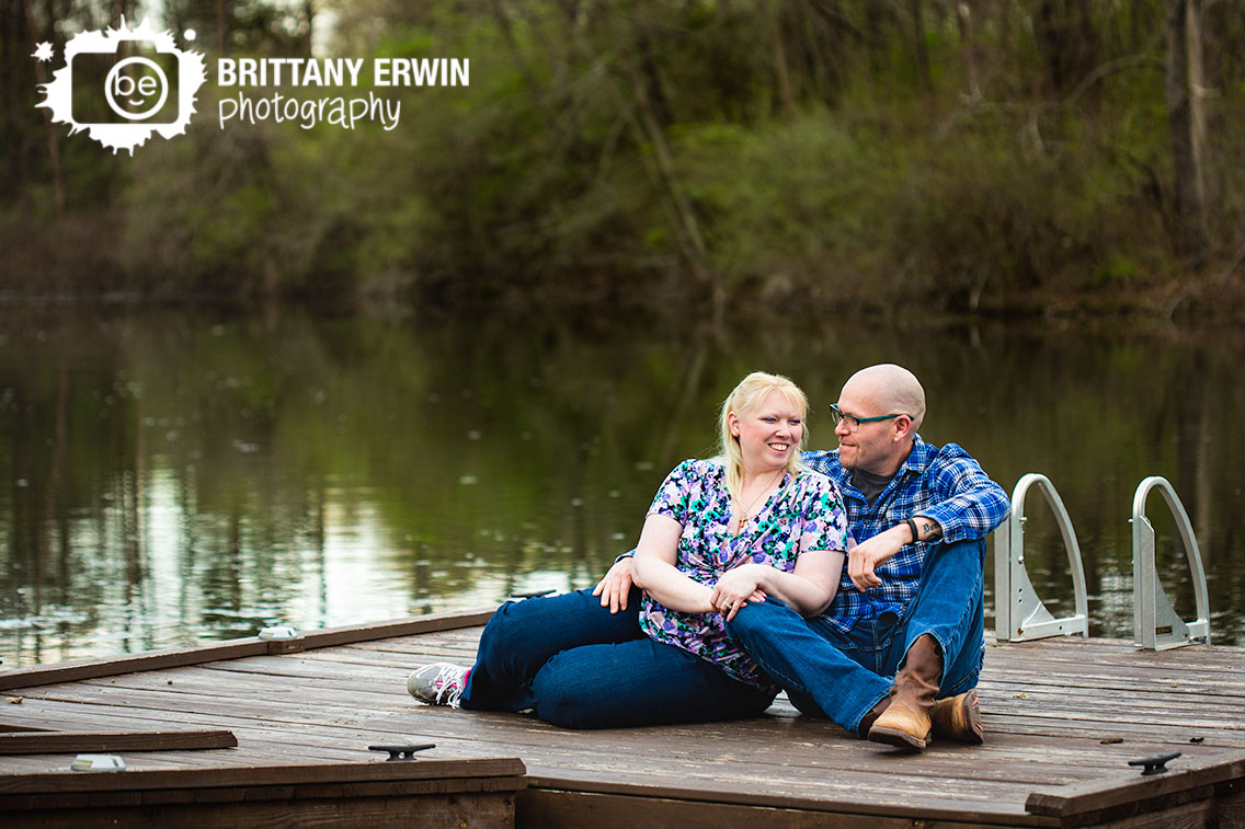 Camby-Indiana-engagement-photographer-couple-on-floating-dock-on-pond.jpg