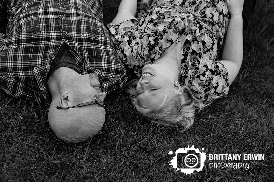Camby-Indiana-engagement-portrait-photographer-couple-lay-in-grass.jpg