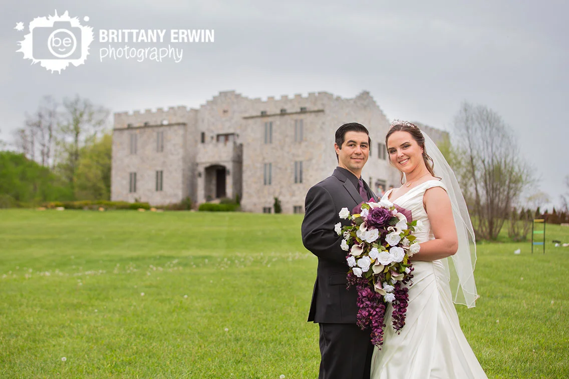Clayshire-Castle-Indiana-wedding-photographer-couple-in-front-of-venue.jpg