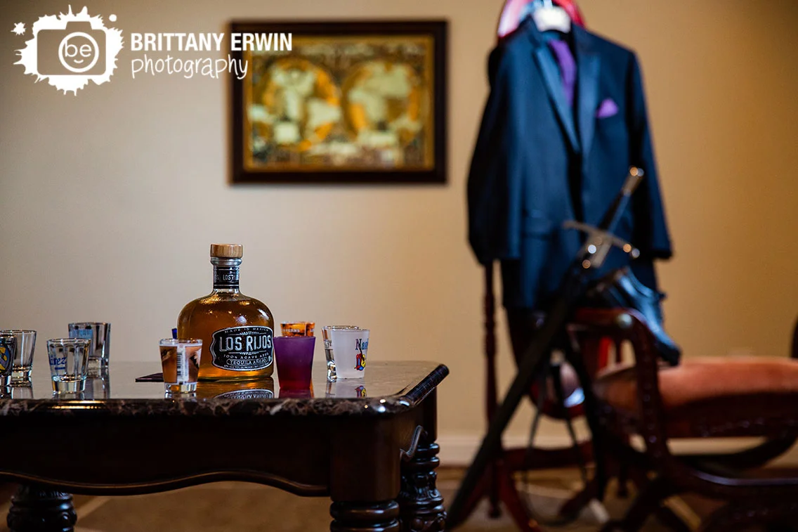 Clayshire-Castle-wedding-photographer-tequila-shots-cinco-de-mayo-ring-of-glasses.jpg