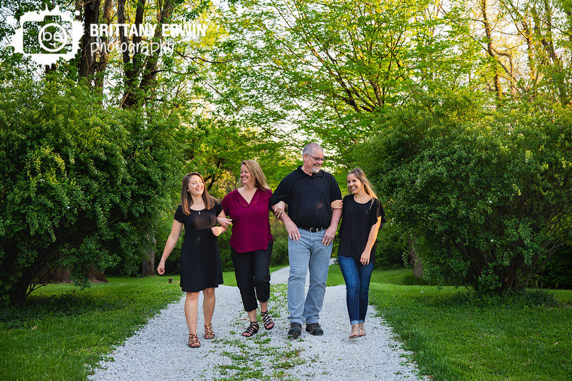 Indianapolis-family-portrait-photographer-group-walking-outside-spring-daughters.jpg