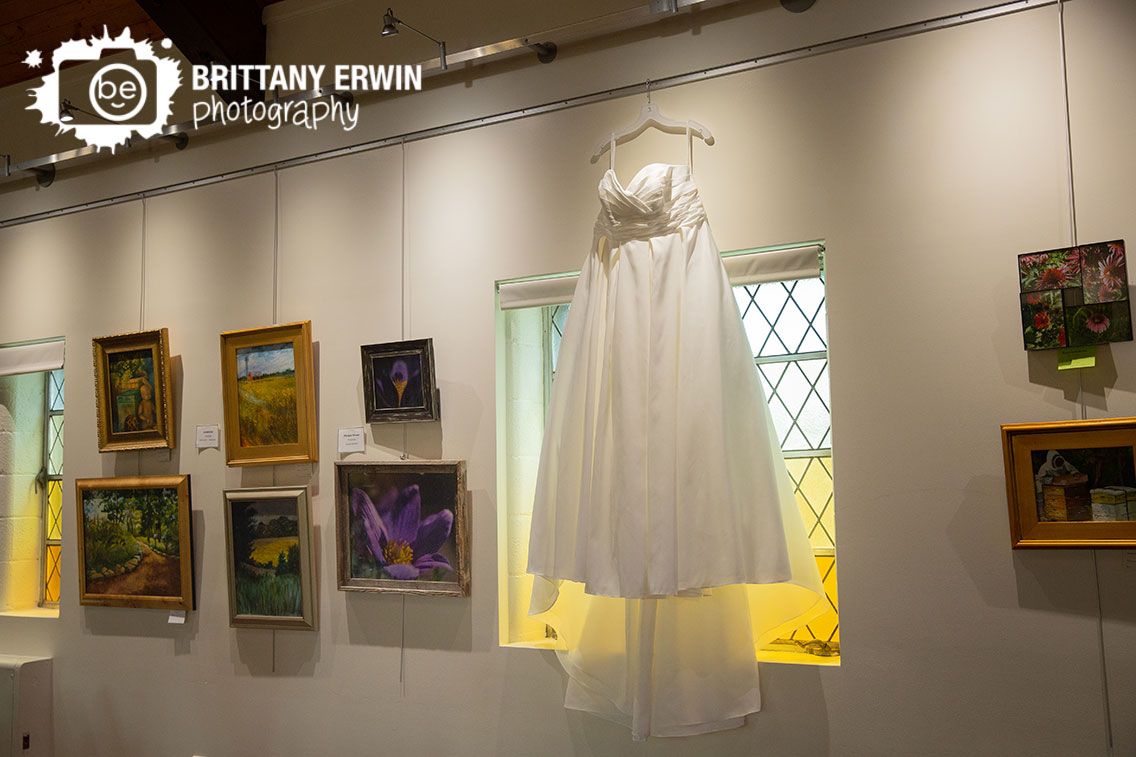 Art-Sanctuary-of-Indiana-wedding-photographer-bridal-gown-gallery-framed-window.jpg