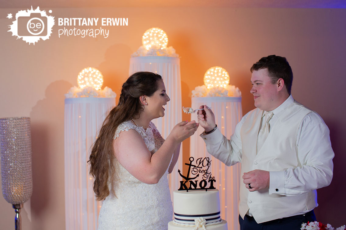 Jones-Crossing-Banquet-and-Event-Center-cake-cutting-feed-to-bride.jpg