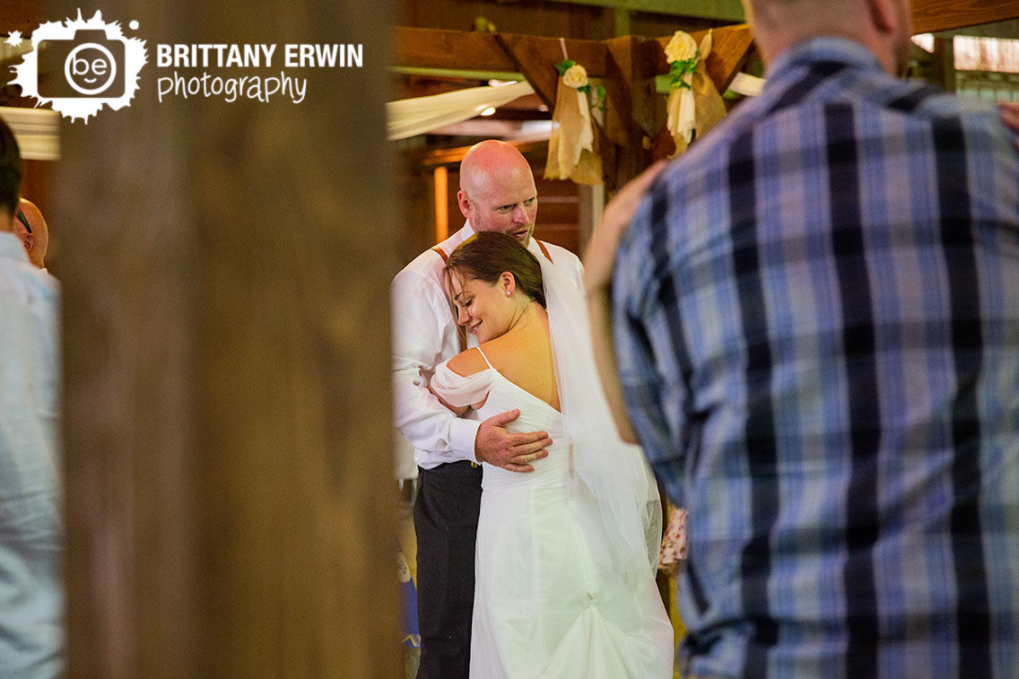 Bride-and-groom-first-dance-with-group-barn-wedding-photographer.jpg