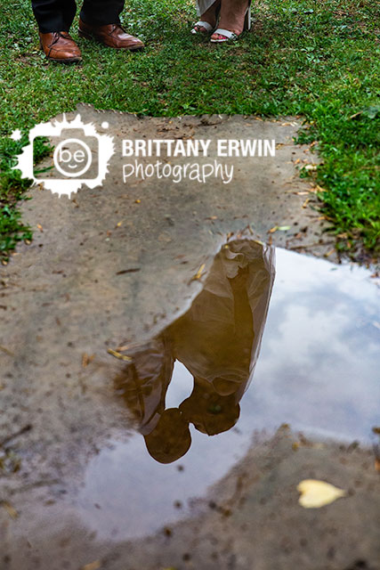 heart-puddle-couple-kiss-wedding-photographer-rainy-day.jpg