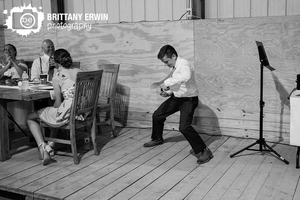 Indianapolis-barn-wedding-photographer-son-toast-silly.jpg