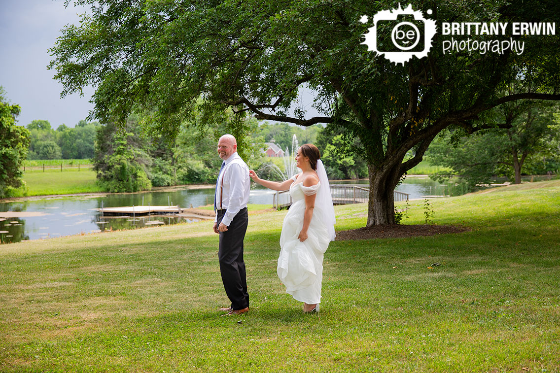 Wedding-photographer-first-look-groom-turning-to-see-bride.jpg