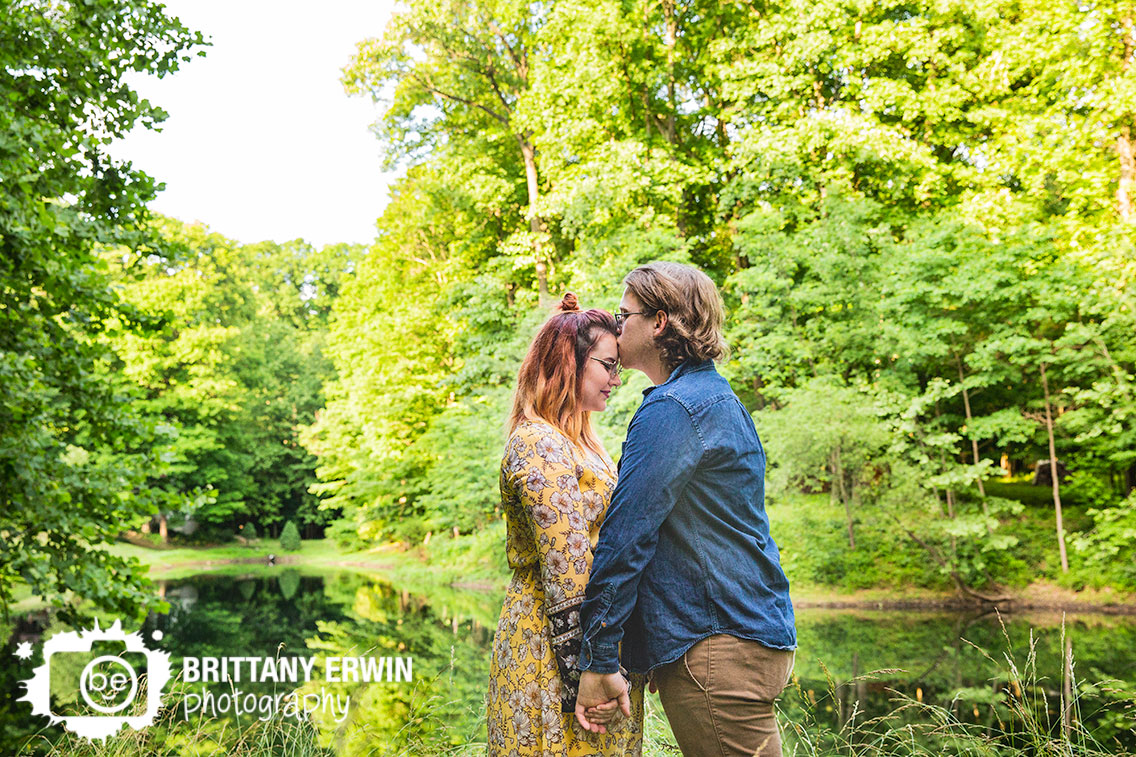 Outdoor-pond-portrait-session-couple-forehead-kiss.jpg
