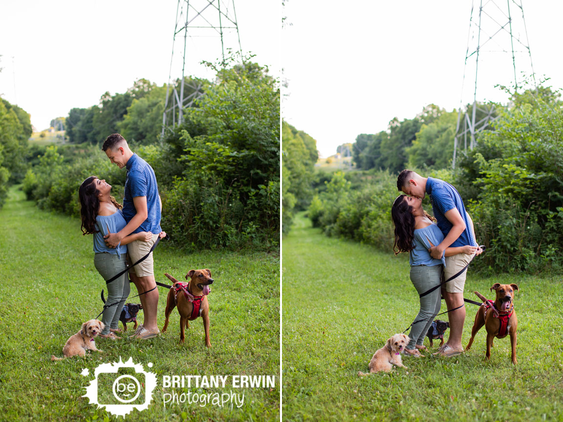 Indianapolis-101-dalmatians-dogs-engagement-portrait-photographer-couple-wrapped-in-leashes.jpg