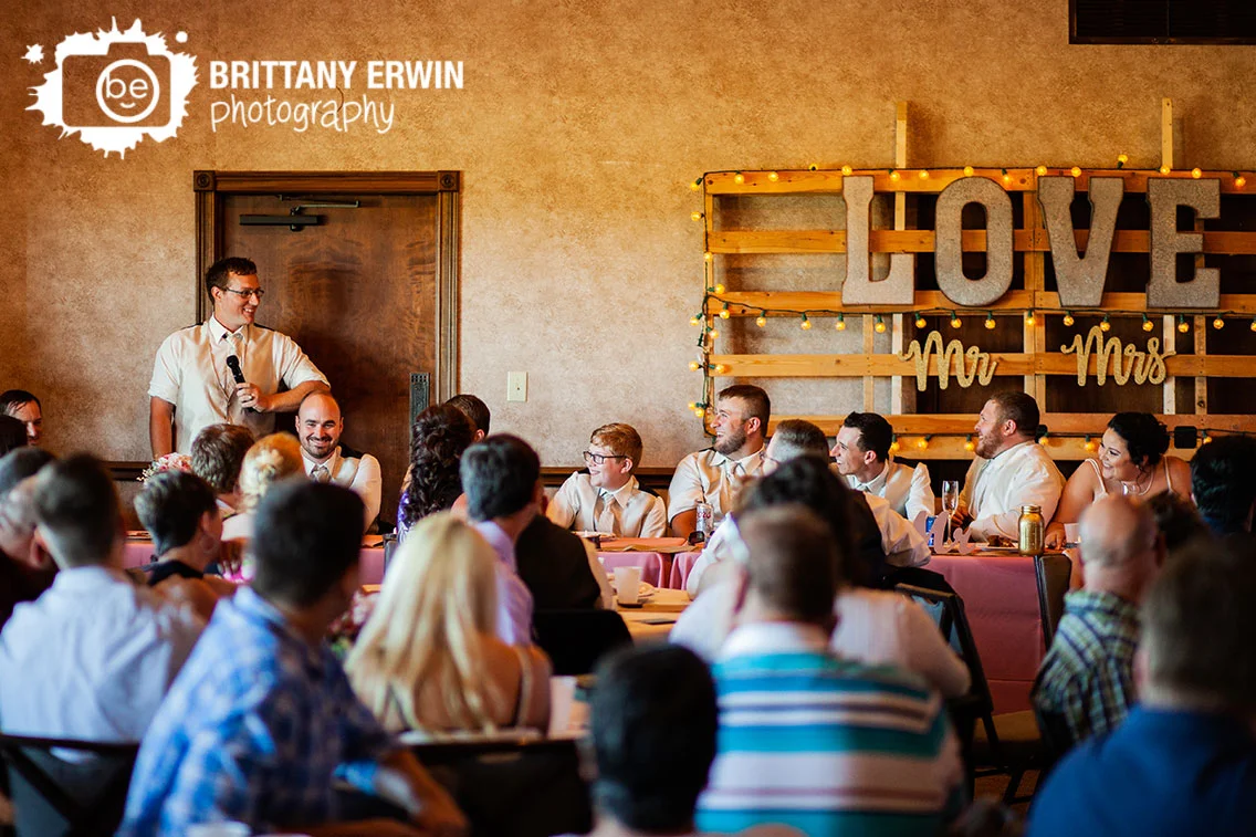 Wedding-reception-toast-love-sign-bride-groom-reaction.jpg
